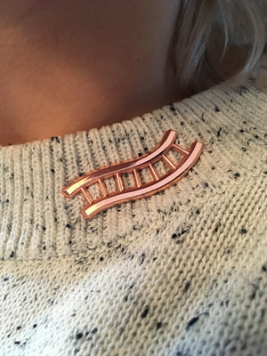 Ladder molded pin