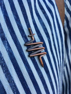 Sword molded pin