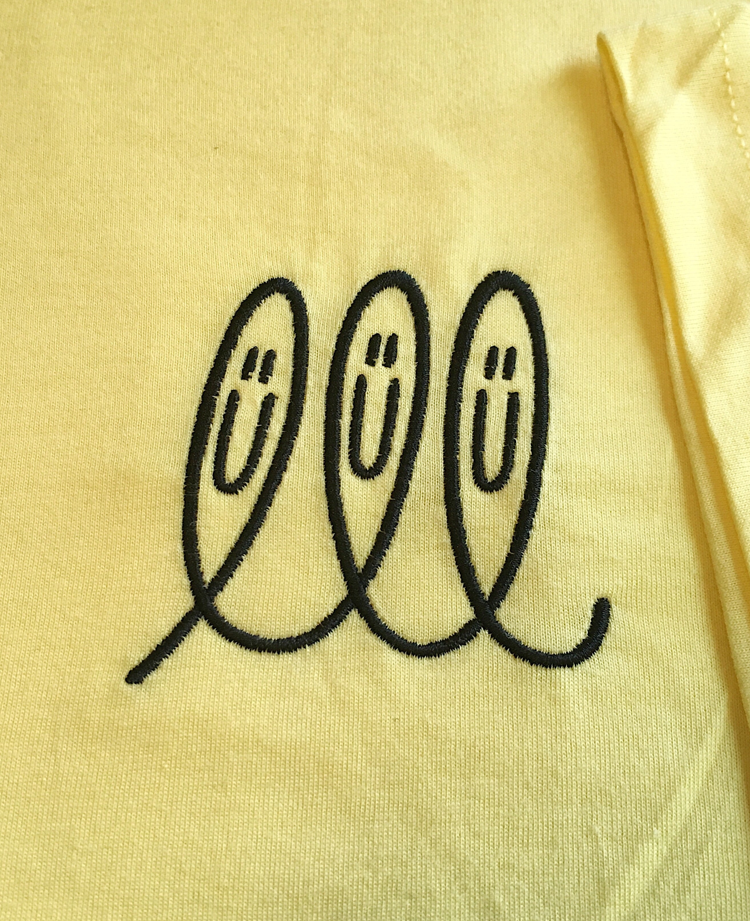 Cursive Face Embroidered T-Shirt